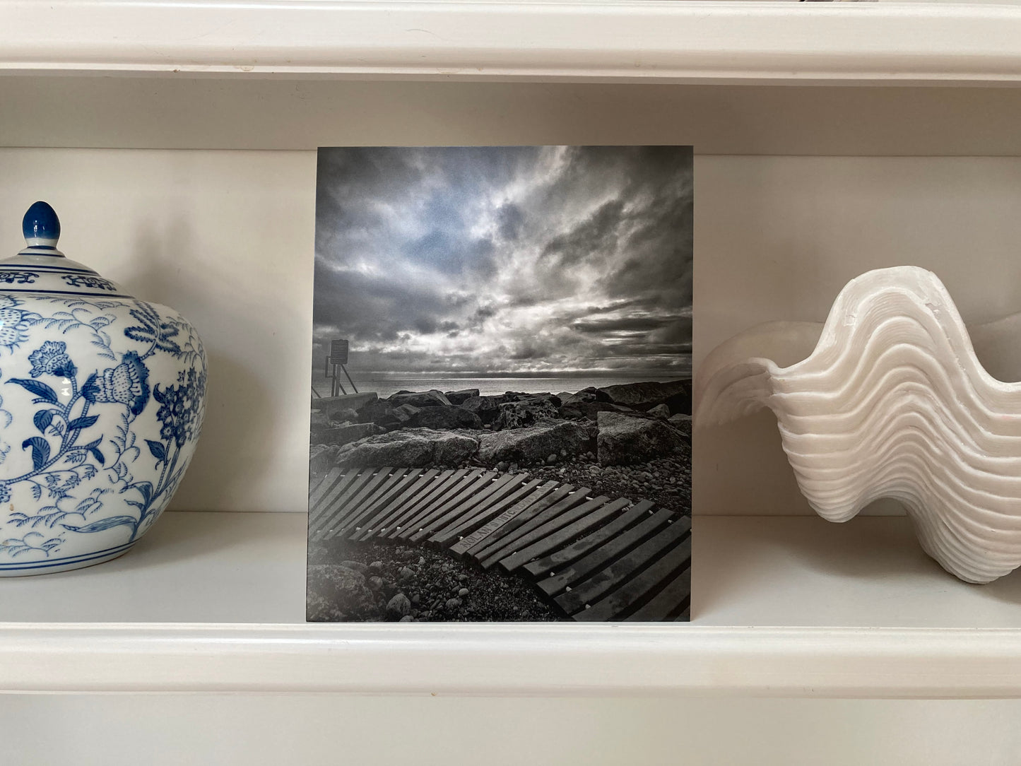 Ocean waves crashing like roller coaster tracks, dramatic seascape fine art photography in 8x10 print size.