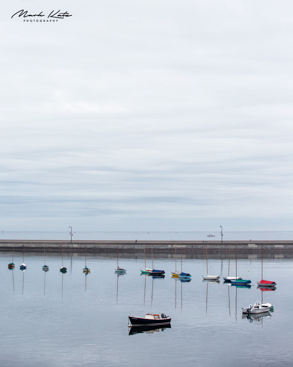 Townie sailboats, moored in a comma shape, abstract nautical fine art photography for modern spaces.