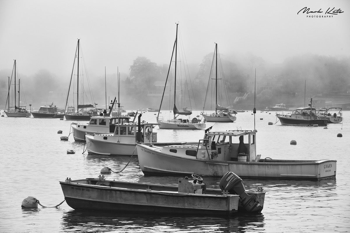 Boats emerging from swirling fog by Mark Katz Photography