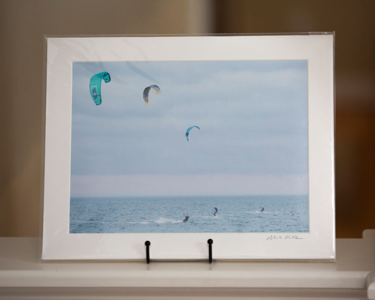 Matted print of kite surfers on a calm sea by Mark Katz Photography
