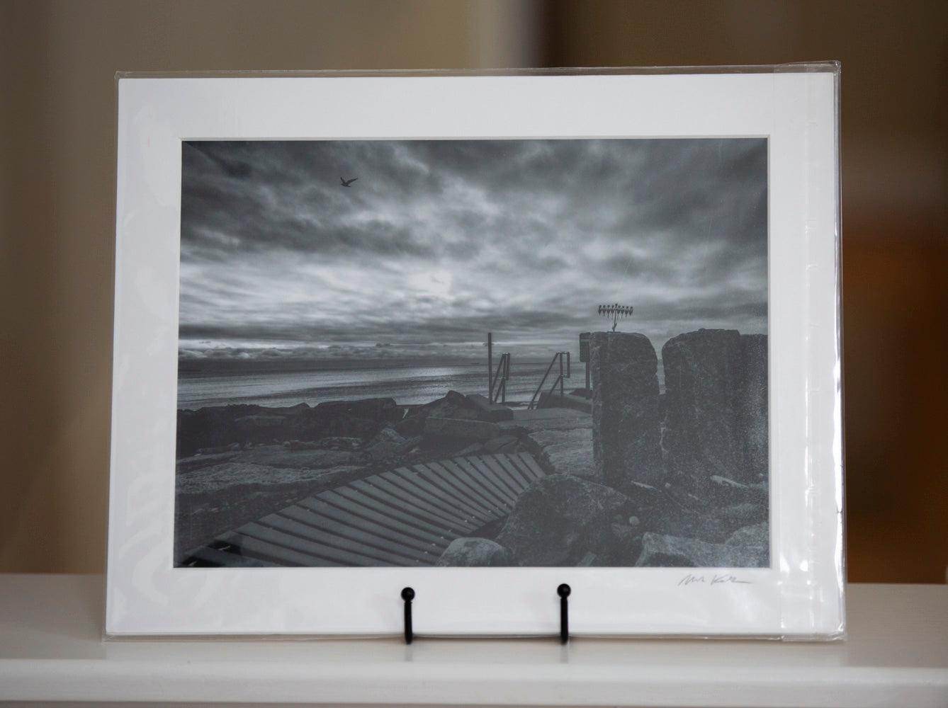 Matted black and white print of a Menorah on Preston Beach by Mark Katz Photography