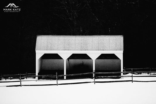 Snowy modern architecture captured in striking black and white fine art photograph of Vermont style.
