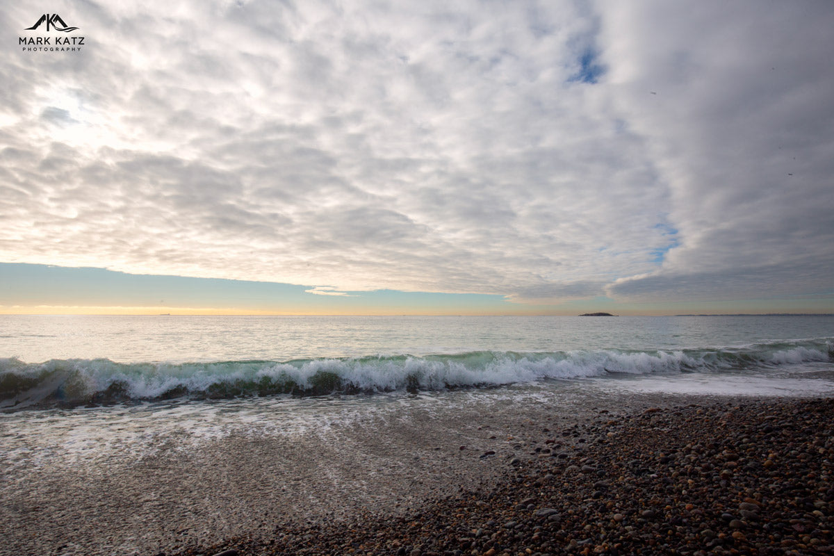Soft waves rolling on sandy beach, serene coastal delight fine art photography perfect for seaside decor.