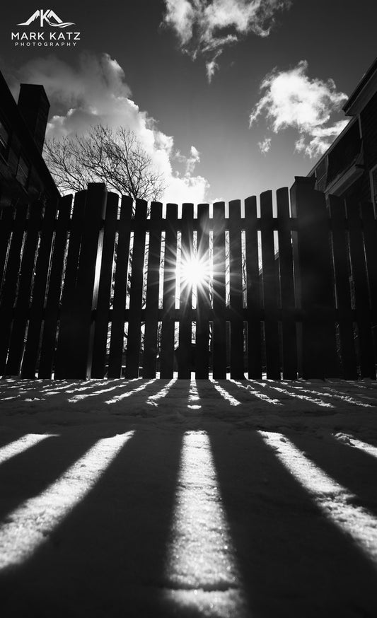 Black and white geometric reflections with snowy foreground, modern fine art photograph.