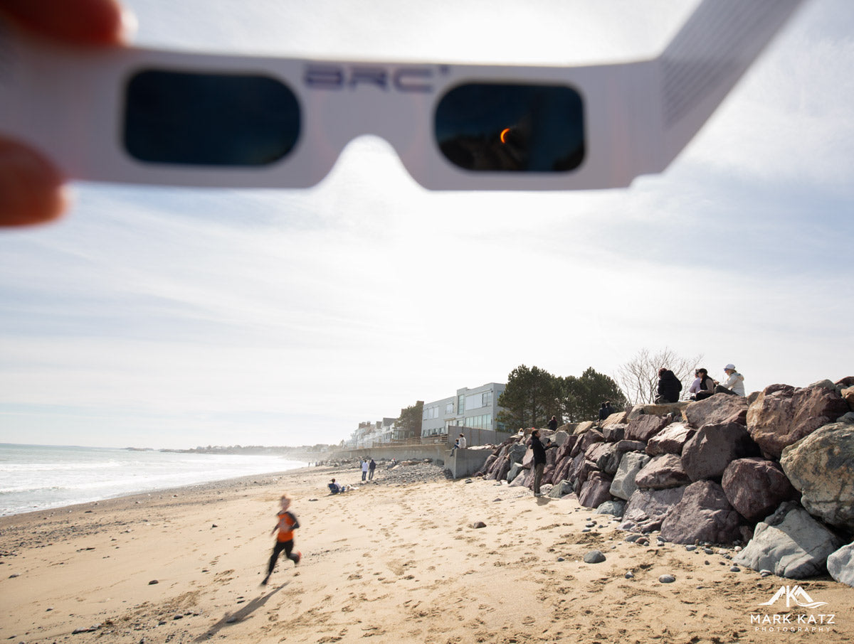 Excietment of solar eclipse almost at totality in Marblehead, MA, by Mark Katz Photography