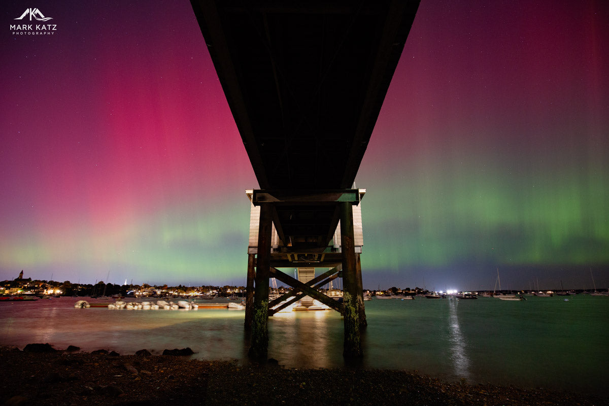Intense aurora borealis underneath Eastern Yacht Club pier; stunning fine art photography