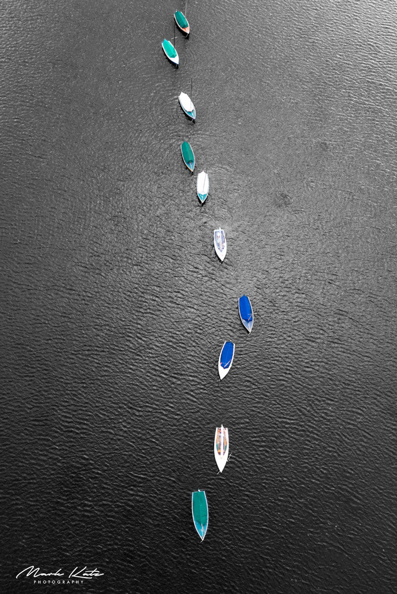 Aerial view of Racer's Row sailboats in Marblehead, MA, dynamic maritime fine art photography.
