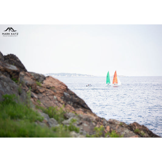 Distant sailboats in summer haze, coastal fine art photography piece.