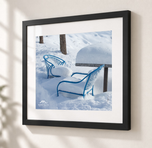 Blue Chairs Beneath Snow in Flat Black frame with white archival mat