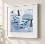 Blue Chairs Beneath Snow in Gallery White frame with white archival mat