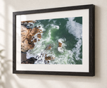 Castle Rock Marblehead Coastal Wall Art – Aerial Ocean Photography in Ebonized Oak frame with white archival mat