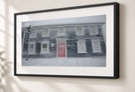 Red Door in Snow in Gallery Black frame with white archival mat