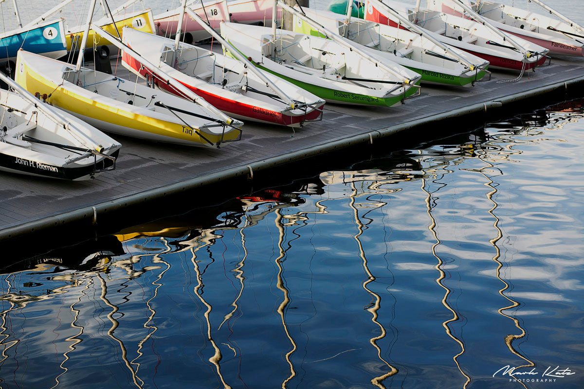 Boats and water reflections captured in crisp detail, nautical reflections fine art photography for coastal decor.