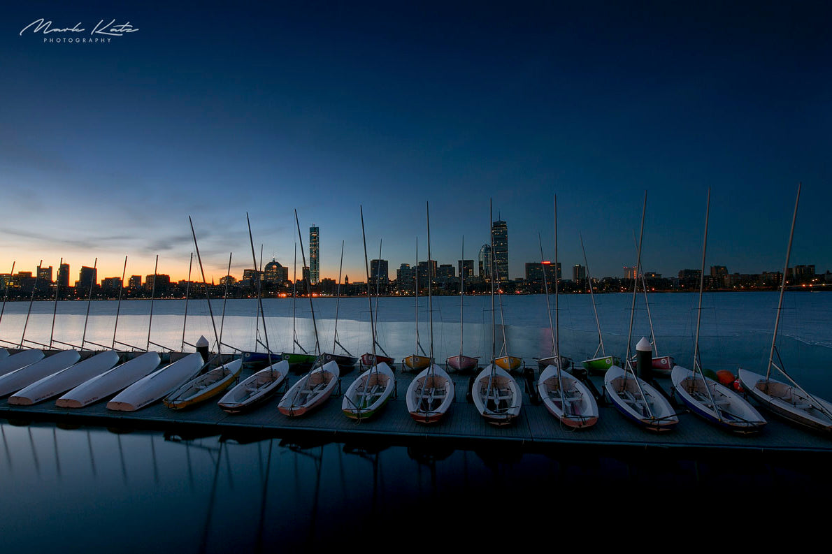 Sailboats lined up neatly in harbor, crisp nautical lineup fine art photography perfect for coastal spaces.