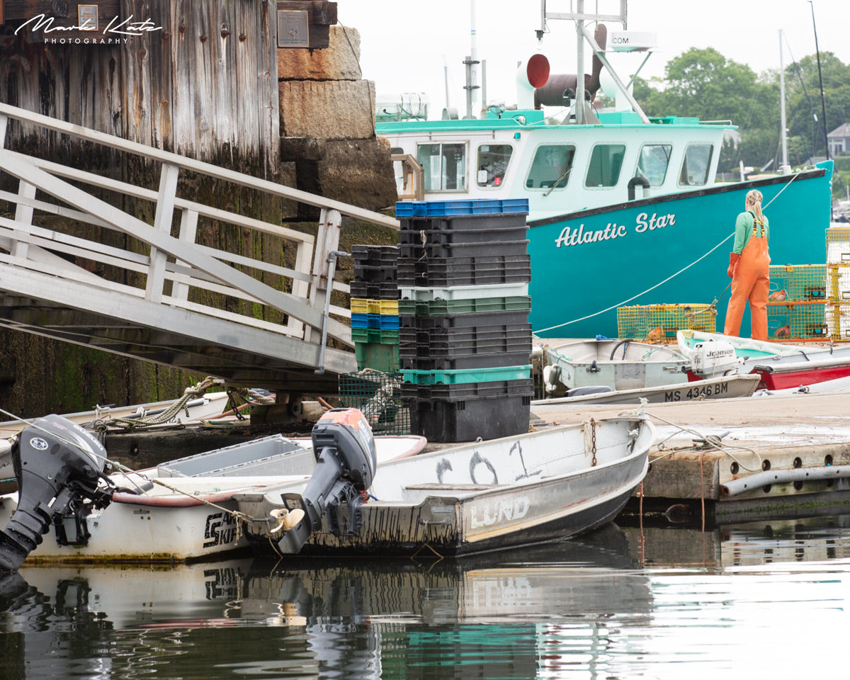 Sunlit boats anchored in harbor, peaceful maritime morning fine art photography decor.