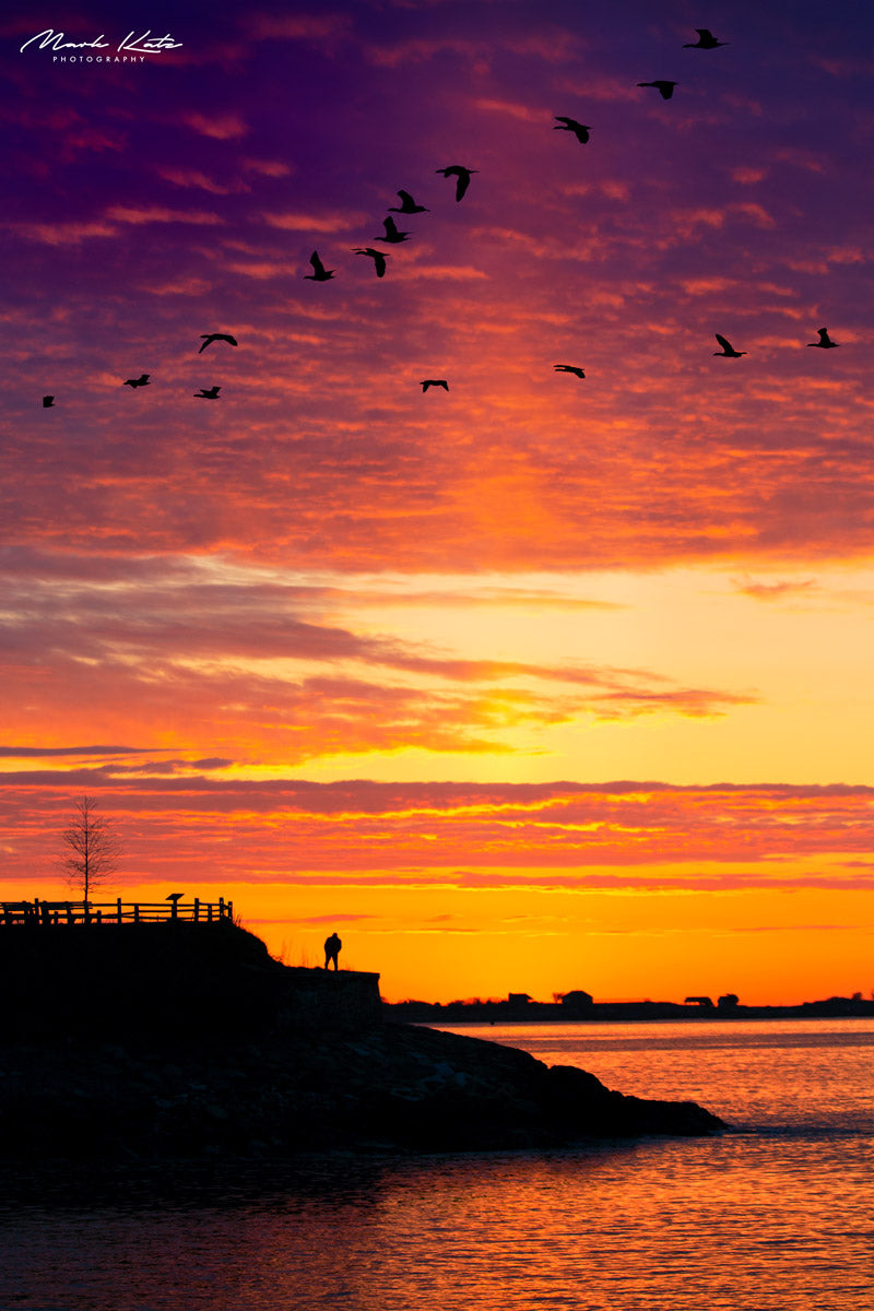 Brilliant sunset sky symbolizing northern migration, dramatic fine art photography for seasonal decor.