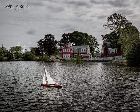 Mini sailboat on Redd's Pond in Marblehead, MA 