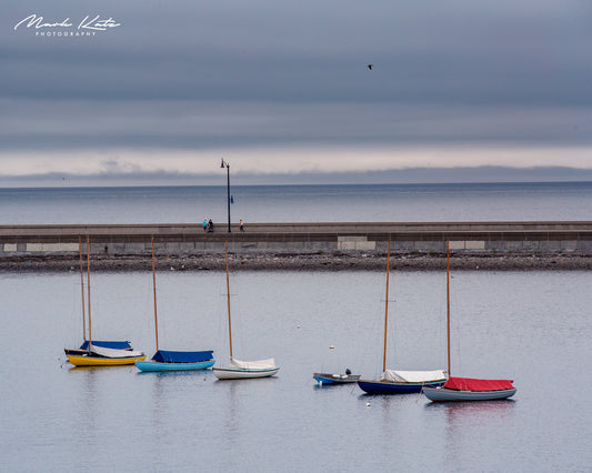 Townie sailboats forming artistic pattern on ocean surface in Marblehead, MA by Mark Katz Photography
