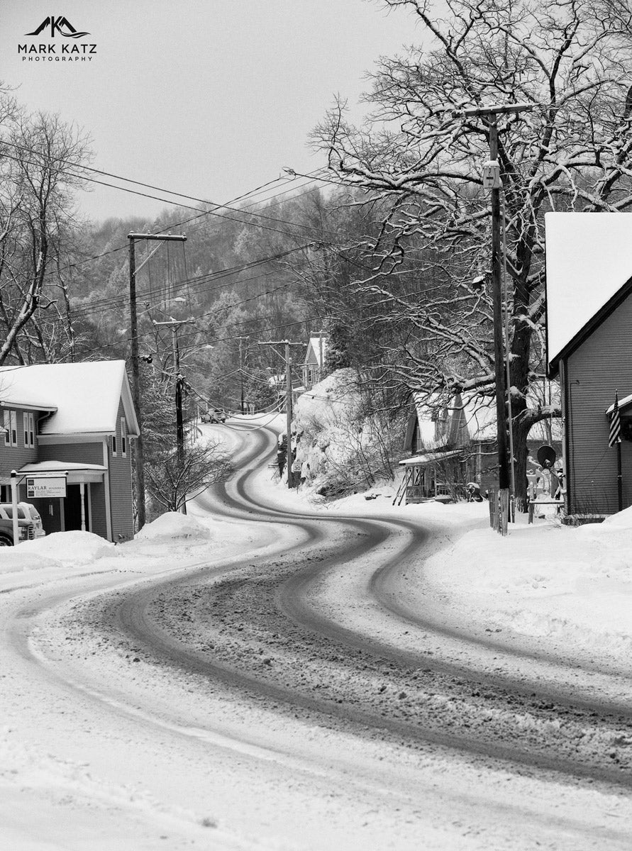 Curvy snowy road in Vermont, classic winter scene fine art photography for nostalgic decor.