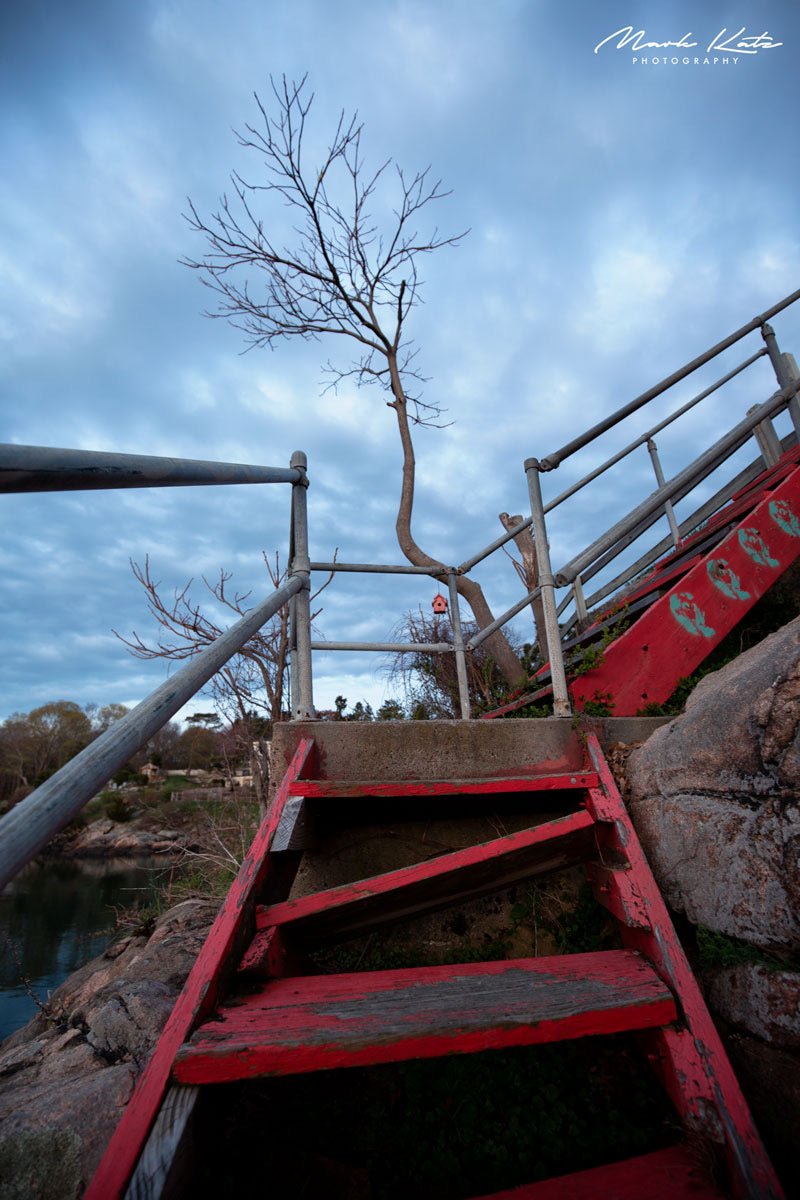 Dramatic red staircase captured in bold perspective