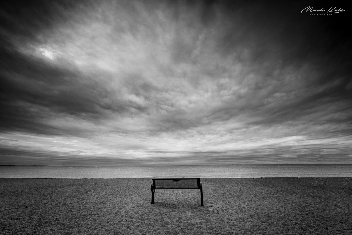 Calm ocean horizon captured in soft minimalist tones, exuding zen tranquility in fine art photography.