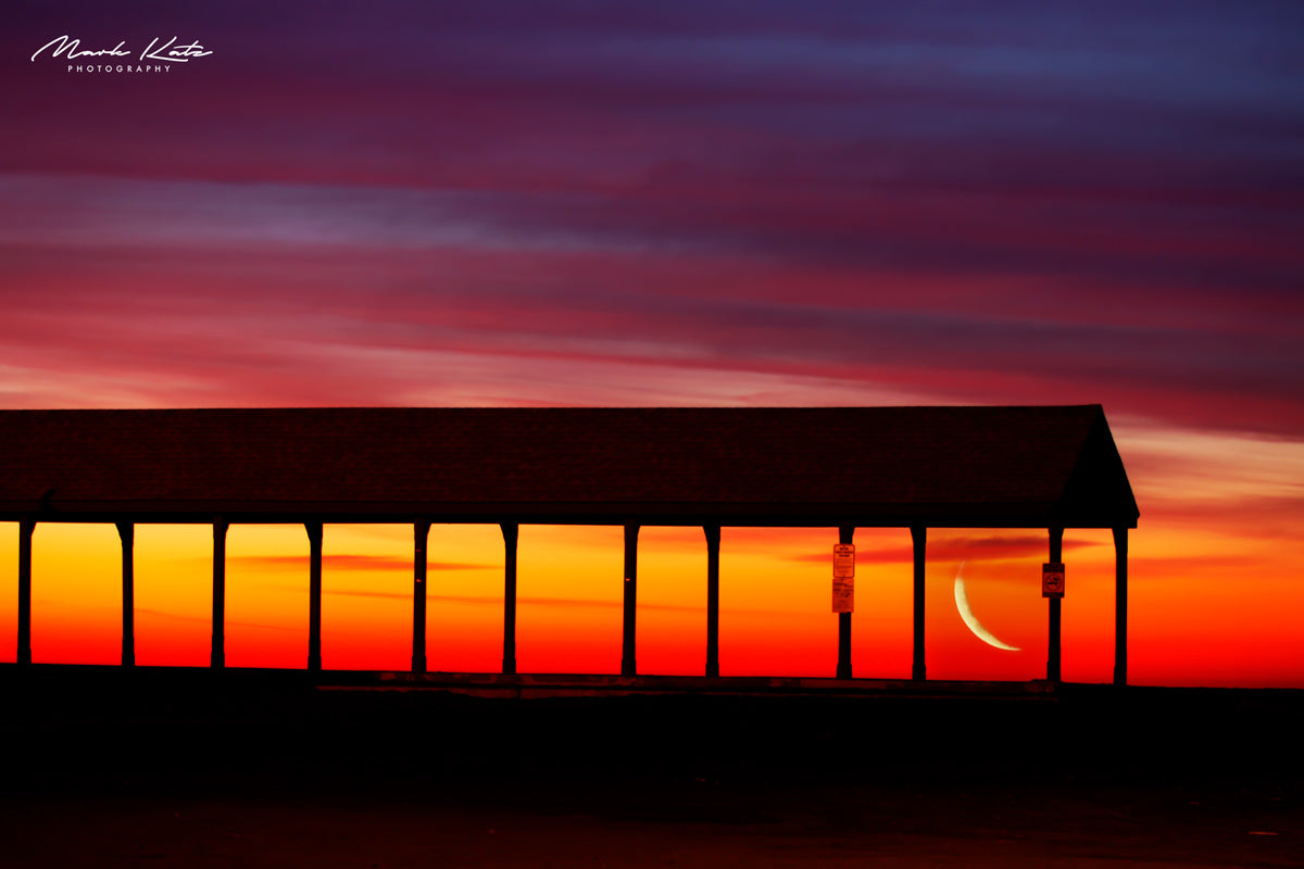 Crescent moon rising at sunrise over Devereux Beach, ethereal nautical fine art photography print.